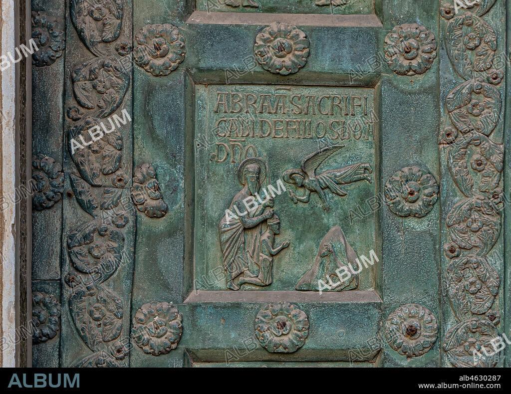 Monreale Cathedral, the gate by Bonanno Pisano (1185-6): bronze tile depicting "Isaac's Sacrifice" (scene of the Old Testament).. The gate is signed "Bonanno civis pisanus". It depicts five scenes of the Old Testament at the bottom, starting with Adam and Eve, and five scenes of the New Testament at the top, ending in "Christ and Mary in the glory of Paradise".