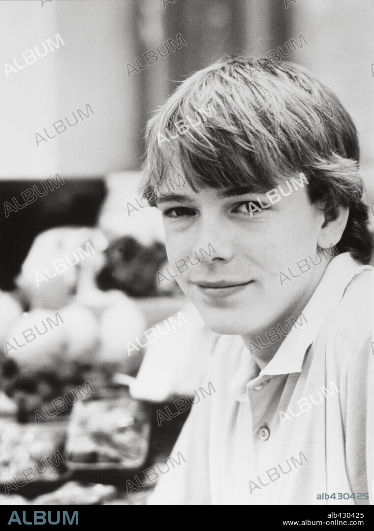 ADAM WOODYATT in EASTENDERS-TV, 1985. Copyright BBC.
