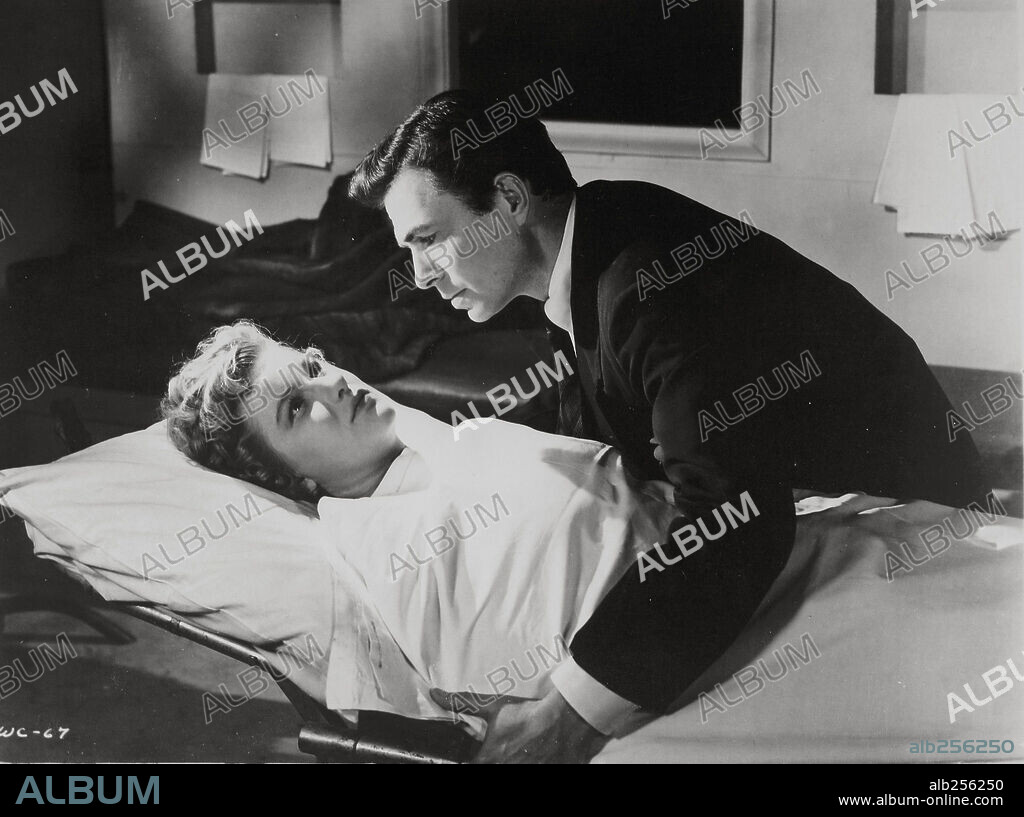 BARBARA BEL GEDDES and JAMES MASON in CAUGHT, 1949, directed by MAX OPHÜLS. Copyright M.G.M.