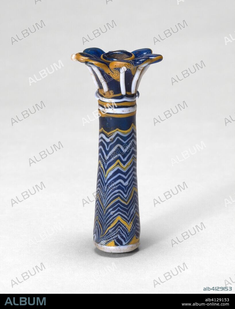 ANCIENT EGYPTIAN. Container for Kohl in the Shape of a Palm Column. Egyptian. Date: 1352 BC-1213 BC. Dimensions: 8.2 × 3.0 × 3.0 cm (3 1/4 × 1 1/8 × 1 1/8 in.). Glass, core-formed technique. Origin: Egypt.