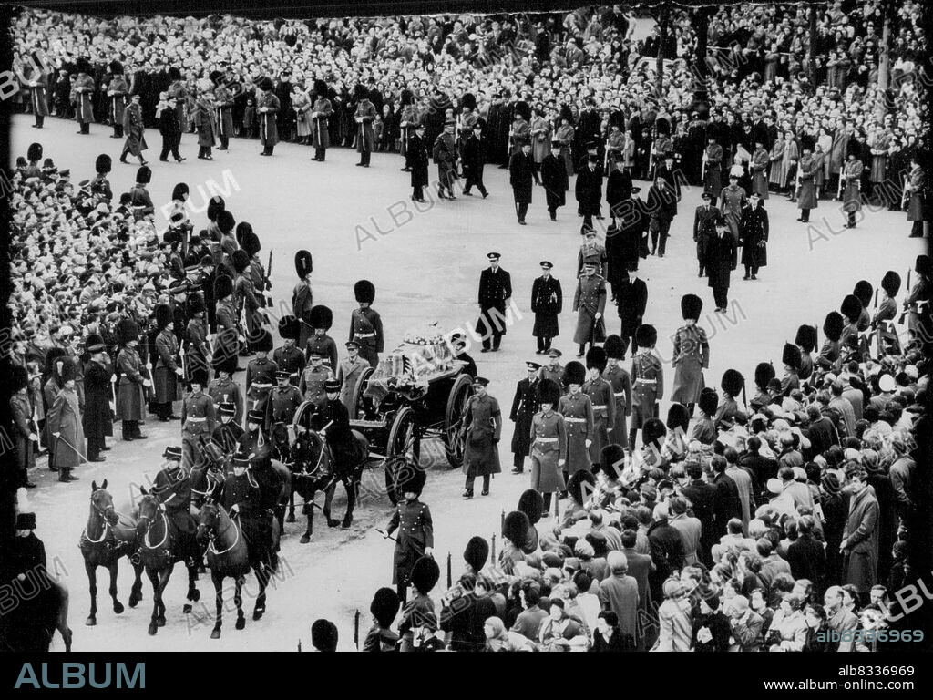 The Funeral Procession of Queen Mary -- The cortege passing from The Mall into the Horse Guards Parade towards Westminster Hall. The body of the late Queen Mary was taken in procession from her residence Marlborough House - to Westminster Hall, where the Lying-in-State will last until the early hours of Tuesday. The coffin will then be taken to Windsor for the burial in St. George's Chapel. March 29, 1953. (Photo by Sport & General Press Agency, Limited).