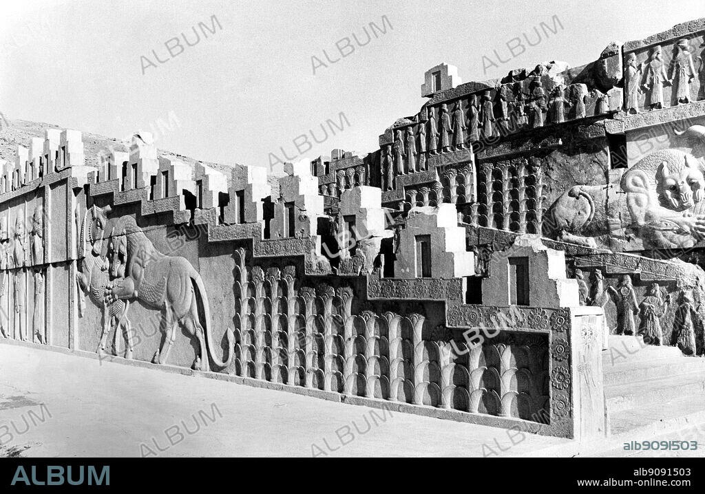 Apadana Palace , Persepolis : Ancient city of Persia , capital of the Persian Empire , founded by Darius . Near to modern Shiraz , Iran . The Walls were tiled and decorated with pictures of lions , bulls , and flowers.