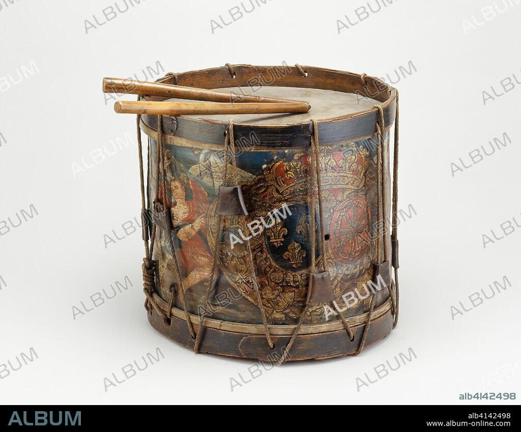 French Military Side Drum and Drumsticks. French. Date: 1765-1770. Dimensions: 64.5 × 43.2 cm (25 3/8 × 17 in.) 
Wt. 12 lb. 12 oz. Wood, brass, iron, hide, cord, and paint. Origin: France.