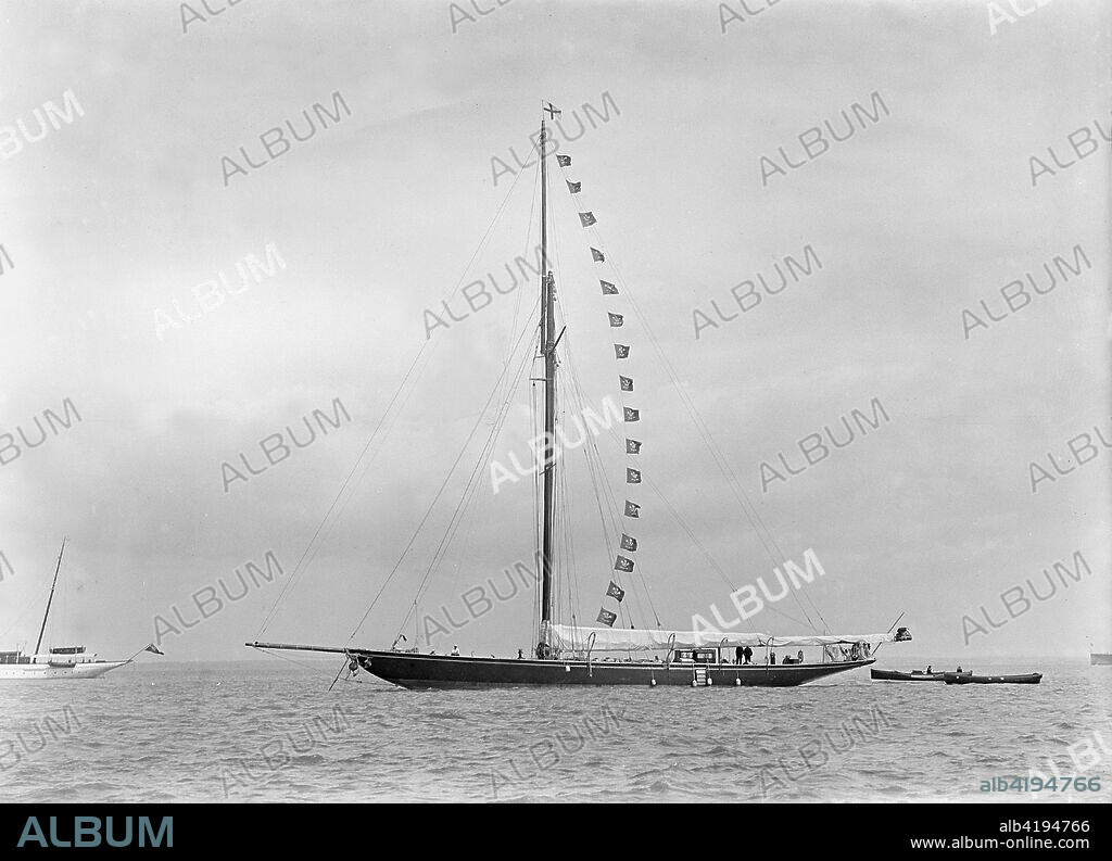 The 221 ton cutter 'Britannia' at anchor with prize flags, 1921. 'Britannia' was owned by King George V. One of the most successful racers of its day, in 1913 it won 8 of the 13 races it entered.