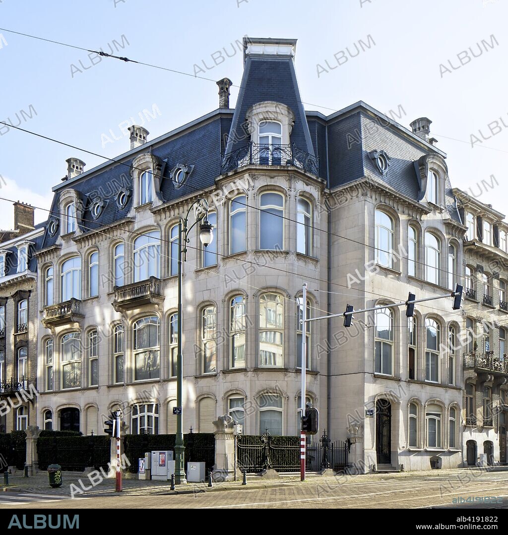 Hotel Vandenbroack, 176-178 Avenue Brugmann/177-179 Avenue Moliere, Brussels, c2014-c2017. Designed by Paul Vizzavona: 1908. White stone facade in balance between French classicism and Art Nouveau with wrought iron fence and gate.