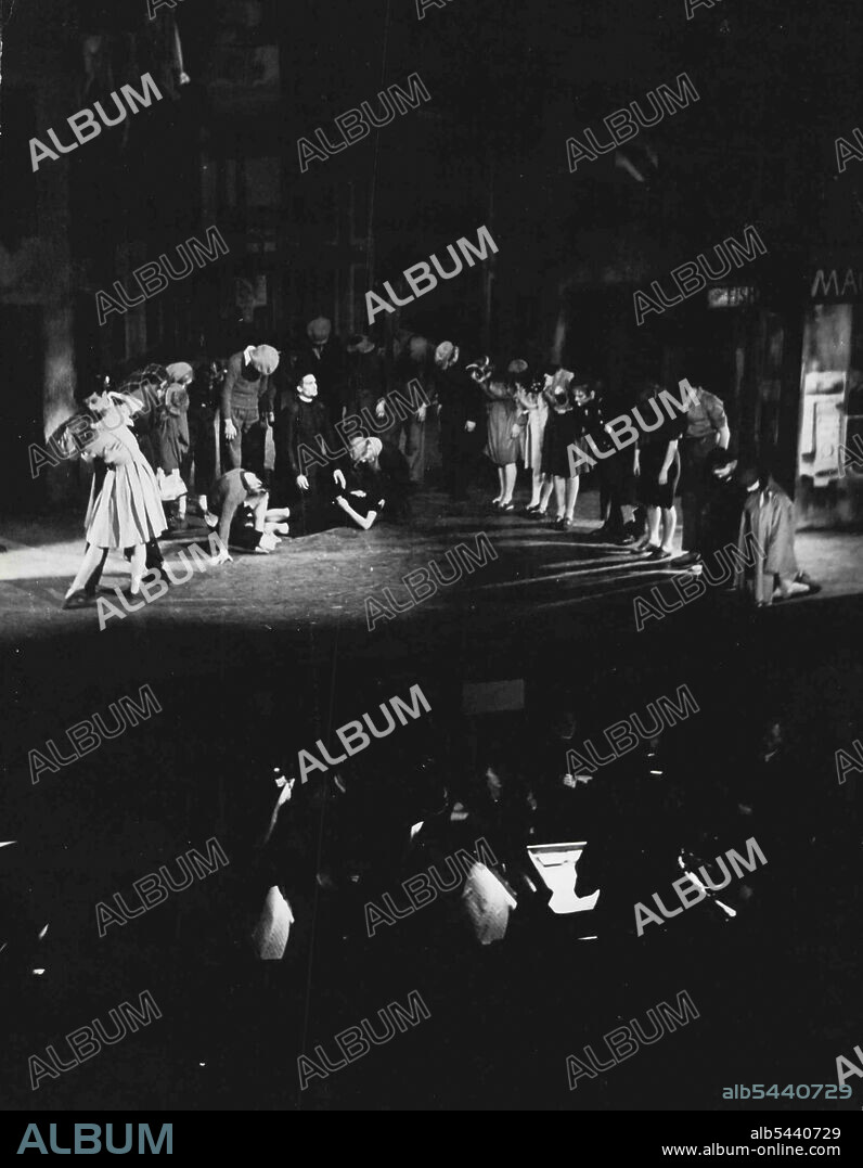 Miracle in the Gorbals - A New Helpmann Ballet -- Miracle in the Gorbals, a new ballet by Robert Helpmann, with music by Arthur Blies and decor by Edward Burra, was presented by the Sudler's Wells company at the Prince's Theatre on Thursday 26th October. Maracle in the Gorbals has a scenario - a modern story set in the Gorbals district of Glasgow - by Captain Michael Bonthall, R.A., who devised the production of Hamlet in which helpmann acted the prince last spring. The music by Arthur Bliss was specially composed for the ballet. Edward Burra contributed the decor for Hinette De Valois Barabau and for Frederick Ashton's Rio Grande. Many of his early paintings were of shipyerds, docks, and the type of Glasgow street in which Helpmann's ballet is set. His designs for Miracle in the Gorbals are to be exhibited in November at the Redfern Gallery. The chief solo roles are taken by Helpmann himself, Celia Franca, Pauline Clayden, Moria Shearer, David Paltenghi and Alexis Rassine. The body o.