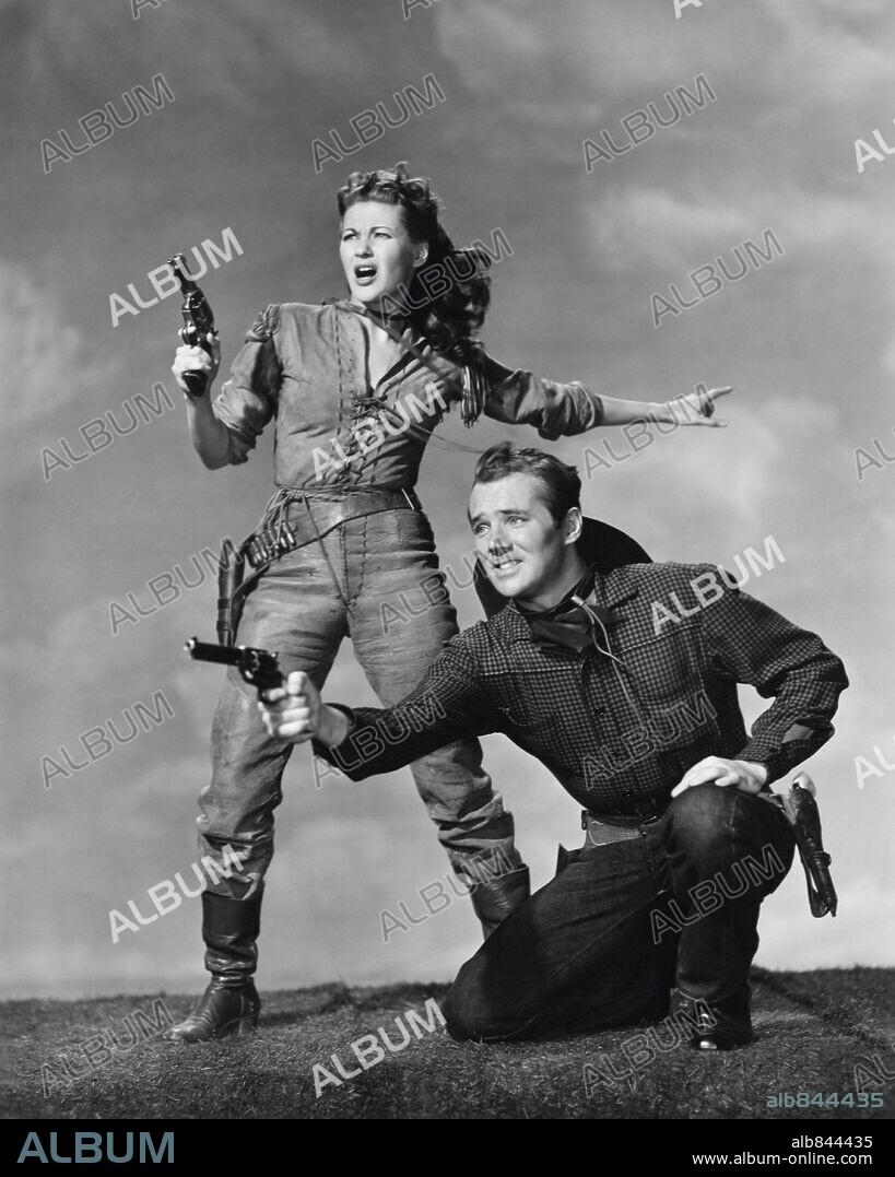 HOWARD DUFF and YVONNE DE CARLO in CALAMITY JANE AND SAM BASS, 1949, directed by GEORGE SHERMAN. Copyright UNIVERSAL PICTURES.