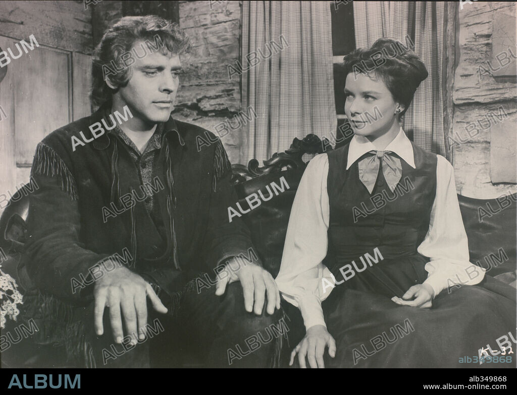 BURT LANCASTER and DIANA LYNN in THE KENTUCKIAN, 1955, directed by BURT LANCASTER. Copyright UNITED ARTISTS.