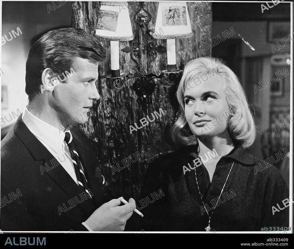 ROGER MOORE in THE SAINT, 1962, directed by LESLIE NORMAN and ROY WARD BAKER. Copyright ITC/BARMORE/NEW WORLD PROD.