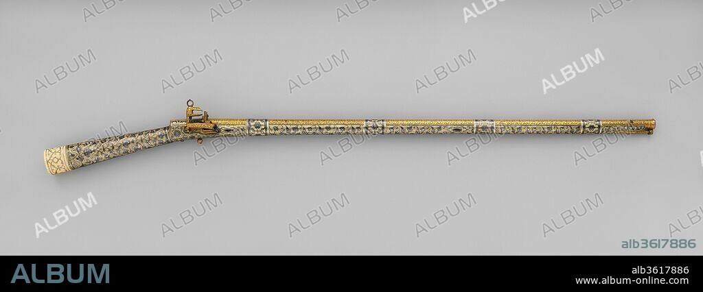 Flintlock Rifle. Culture: Caucasian, Kubachi, Dagestan. Dimensions: L. 52 in. (132.08 cm); Cal. .56 in. (14.22 mm). Date: ca. 1800-1850.
This rifle was probably made in the Dagestani village of Kubachi, the principal armsmaking center in the Caucasus. The Arabic inscription on the barrel, "Owned by Aba Muslim Khan Shamkhal," and the very high quality of the workmanship suggest that it belonged to a member of the family of the ruling prince (shamkhal).