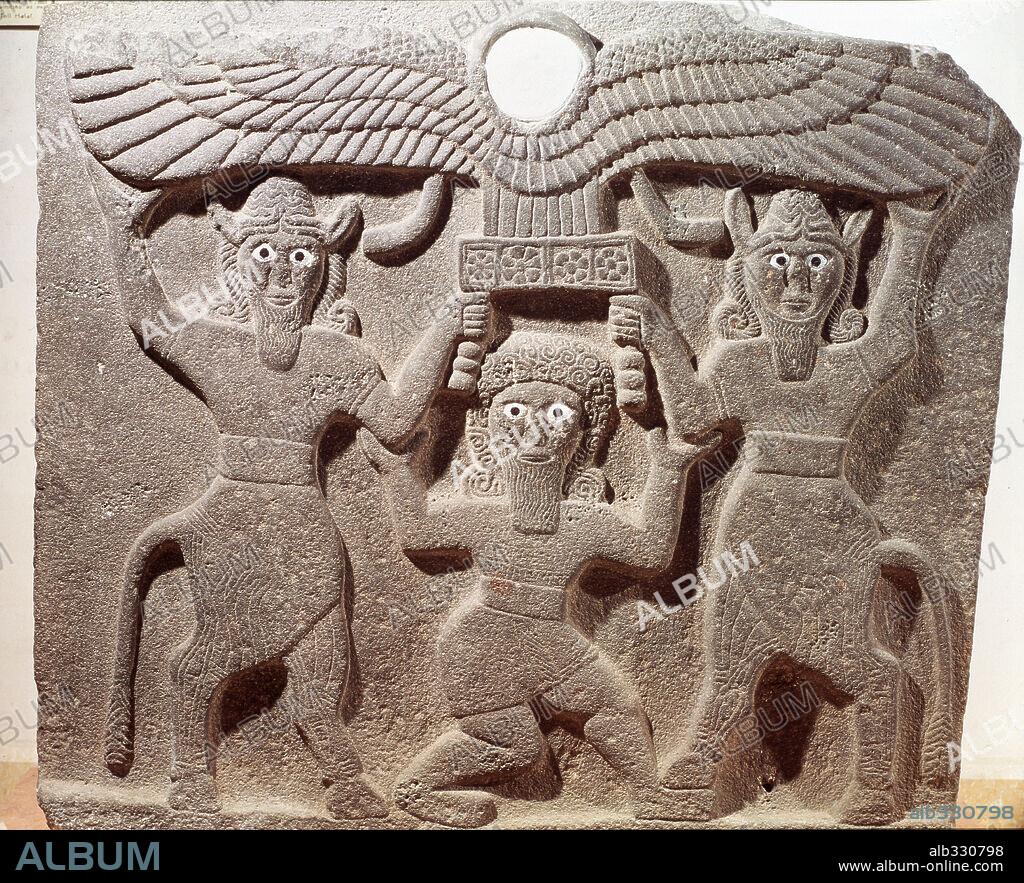 Gilgamesh between two demi gods Syrio Hittite stele 9th century.
