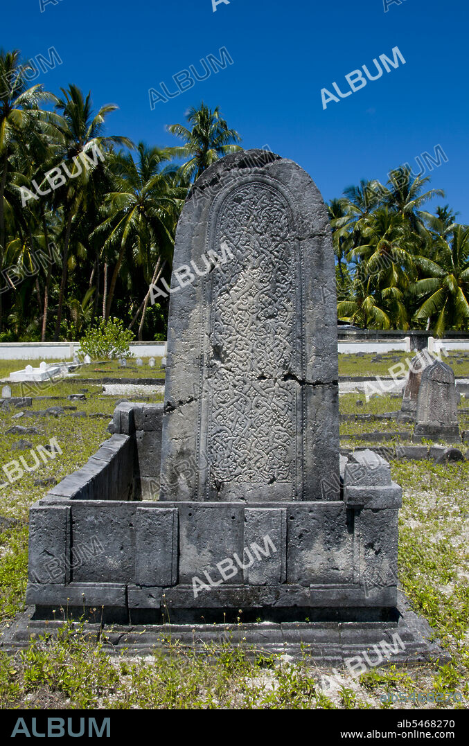 In the Maldives, being a Muslim country, people are buried. Tombstones with a single point on the top are those of men, while those with a rounded top are those of women. Asia's smallest and least-known nation, the Republic of Maldives, lies scattered from north to south across a 750-kilometre sweep of the Indian Ocean 500 kilometres south-west of Sri Lanka. More than 1000 islands, together with innumerable banks and reefs, are grouped in a chain of nineteen atolls which extends from a point due west of Colombo to just south of the equator. The atolls, formed of great rings of coral based on the submarine Laccadive-Chagos ridge, vary greatly in size. Some are only a few kilometres square, but in the far south the great atoll of Suvadiva is sixty-five kilometres across, and has a central lagoon of more than 2000 square kilometres. The northern and central atolls are separated from each other by comparatively narrow channels of deep water, but in the south Suvadiva is cut off by the eighty-kilometre-wide One-and-a-half-Degree Channel. Addu Atoll is still more isolated, being separated from the atoll of Suvadiva by the seventy-kilometre-wide Equatorial Channel.