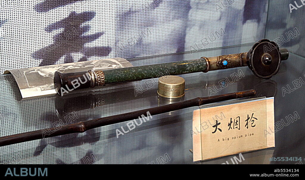 An opium pipe on display at the China Central Television (CCTV) Tower in Beijing, China. 2021.