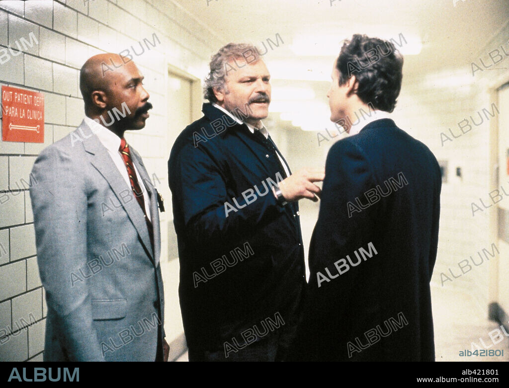 BRIAN DENNEHY and BRYAN BROWN in F / X, 1986, directed by ROBERT MANDEL. Copyright ORION PICTURES.