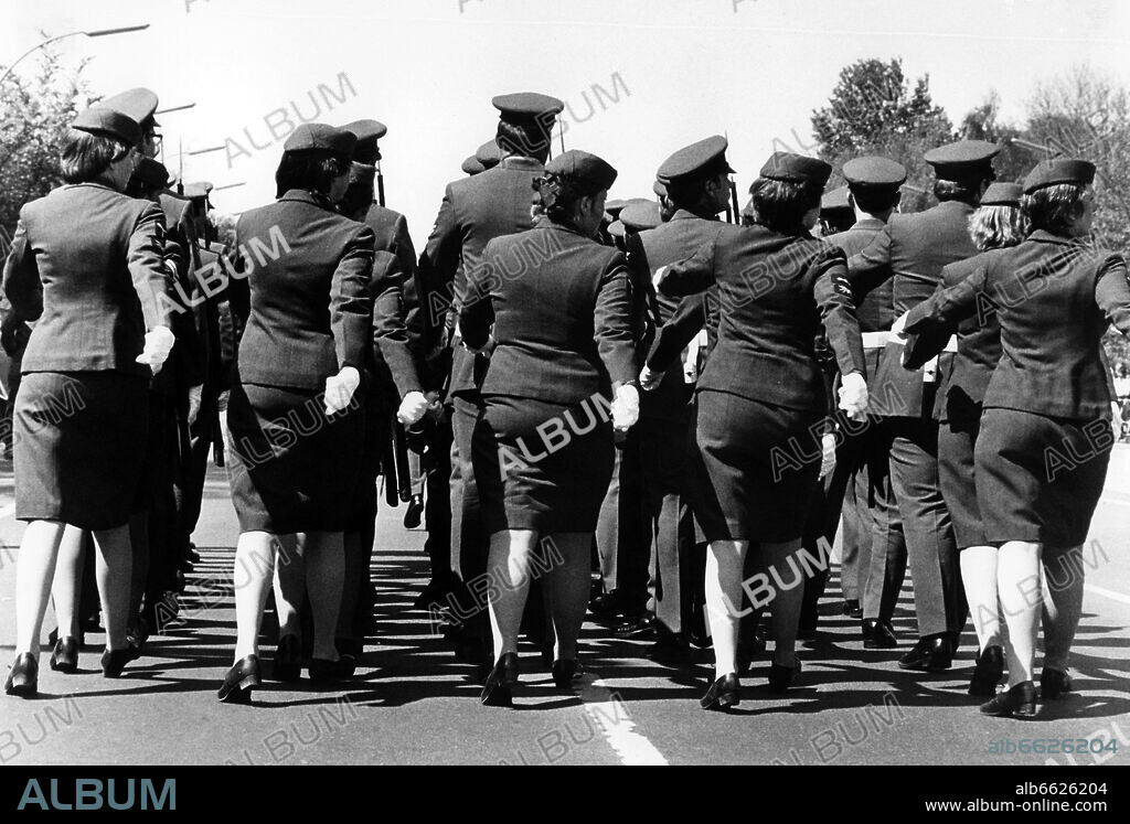 British female soldier marching during a rehearsal for the annual military parade on occasion of the 'Armed Forces Day' on 14th May 1980 in Berlin. 14/05/1980