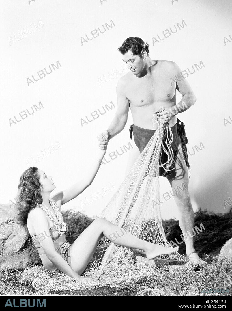 JOHNNY WEISSMULLER in TARZAN AND THE MERMAIDS, 1948, directed by ROBERT FLOREY. Copyright RKO.