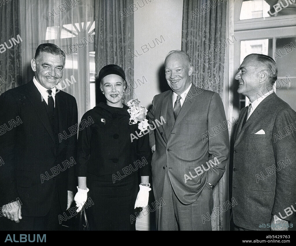 White House, April 2, 1958 -- An aging Clark Gable, his wife Kay Spreckles Gable and manager Mr. Pearlberg, meet with President Eisenhower. Photo: Abbie Rowe.