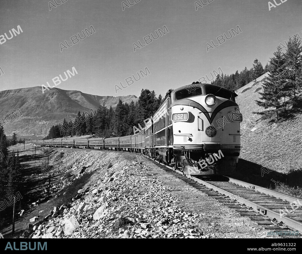 Alberta, Canada 1956 The Canadian National Railway's ""Super Continental"" passenger train as it enters the Athabaska Valley in the foothills of the Rockies.
