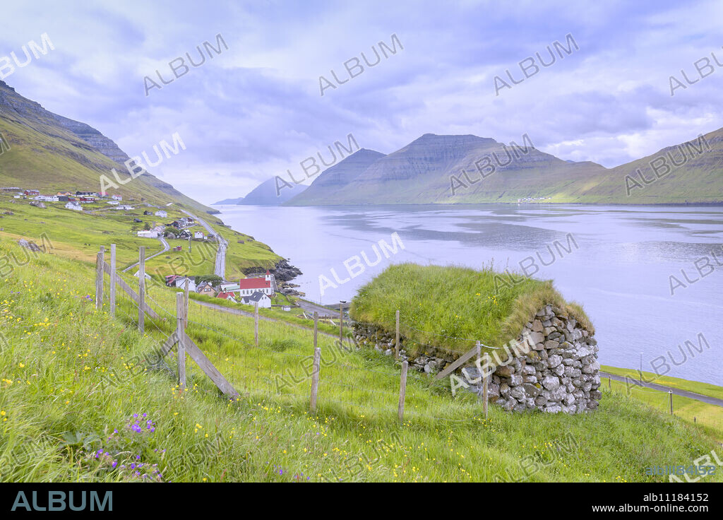 Traditional house with grass roof, Kunoy Island, Nordoyar, Faroe Islands, Denmark, Europe.