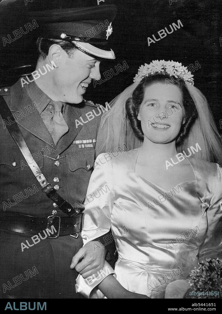 Miss Mary Churchill weds captain Christopher Soames at St. Margaret's Church, Westminster, in London. The bride and bridegroom arriving at the Dorchester Hotel, in London, for the wedding reception, after the ceremony at St. Margaret's Church, Westminster. Mr. Winston Churchill, Britain's war-time Leader, led his youngest daughter Miss Mary Churchill, to the altar at St. Margaret's Church, Westminster, London, when she was married to Captain Christopher Soames of the Coldstream Guards, the only son of Captain Arthur Granville Soames, and the Hon. Mrs. Charles Rhys. February 11, 1947.