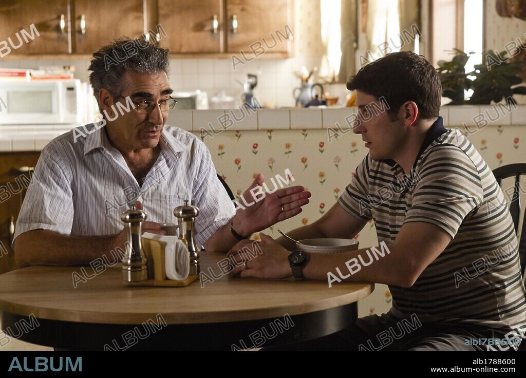 EUGENE LEVY and JASON BIGGS in AMERICAN REUNION, 2012, directed by HAYDEN SCHLOSSBERG and JON HURWITZ. Copyright UNIVERSAL PICTURES.