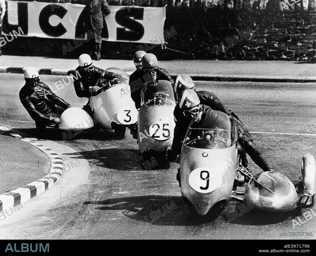 Fritz Scheidegger, Walter Schneider and Helmut Fath competing in a sidecar race, 1959. Schneider, with Hans Strauss, won for the second year running for BMW. BMW won the World Sidecar Championship for no less than twenty years, between 1954-1974.