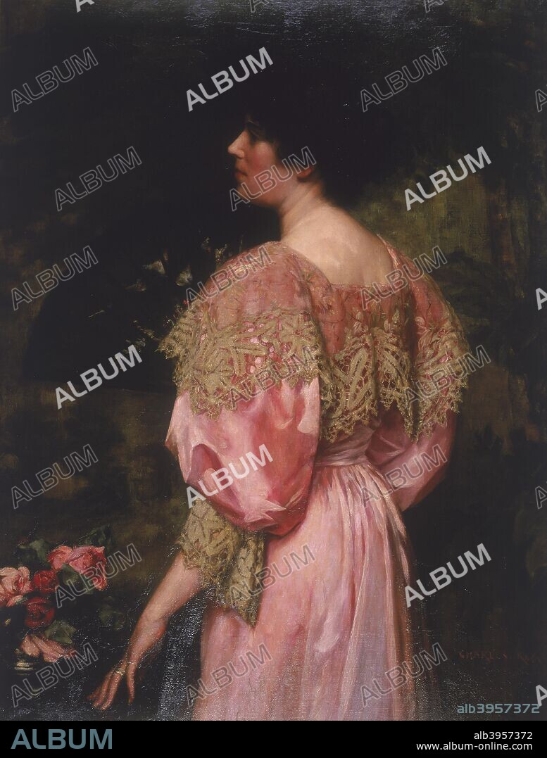 'The Rose-Coloured Gown (Miss Giles)', 1896. Portrait of a young woman in a pale pink dress with lace collar and cuffs. Her face is shown in profile, while only the back of her dress is visible. She looks dreamily off into the distance. By her left hand are roses of the same colour as her dress.