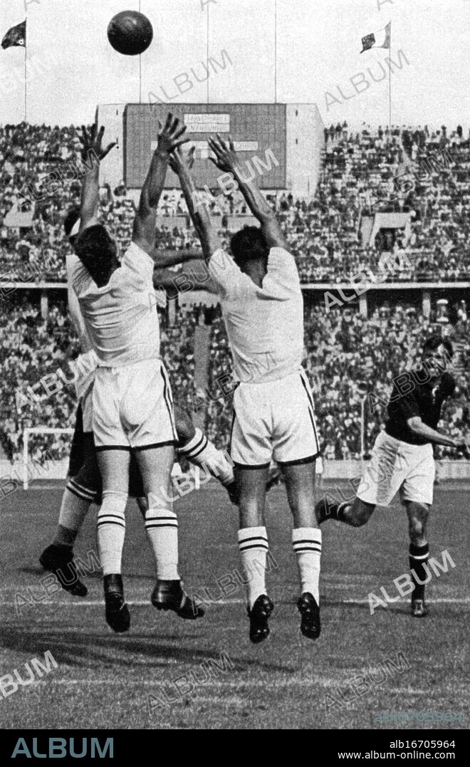 1936 Olympics, Berlin - A punishing throw for Hungary in the handball game Austria v. Hungary. (Ein Strafwurf fur Ungam im Spiele Osterreich - Ungarn). ©TopFoto.