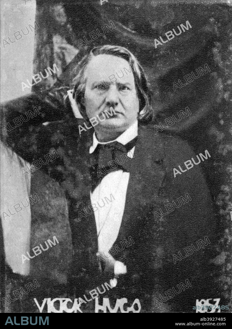 Victor Hugo, French poet, dramatist and novelist, 1853. Born in Besancon, Victor Hugo (1802-1885) was a central figure in the French Romantic movement. In 1848, the year of revolutions in Europe, he was elected to the Assembly as a Republican but after Napoleon III's coup d'etat he was sent into exile, living in Guernsey in the Channel Islands until 1870. His work includes Notre Dame de Paris (1831), Les Miserables (1862), Les Travailleurs de la Mer (The Toilers of the Sea) (1866). Among his plays La Roi s'amuse (1832) was banned. In its guise as Verdi's opera Rigoletto it is universally popular. A photograph from Album de Photographies, Dans L'Intimite de Personnages Illustres, 1845-1890, Editions MD, 22 Rue de L'Arcade, Paris 8, 1845-1890.