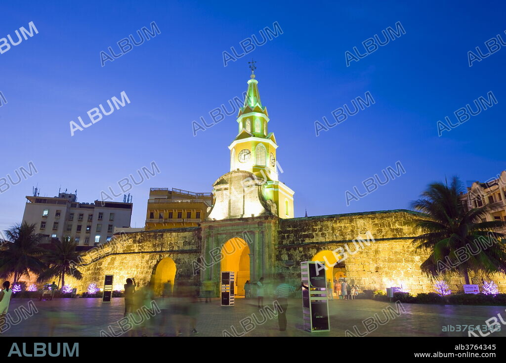 Old Town city wall and Puerto del Reloj at night, UNESCO World Heritage Site, Cartagena, Colombia, South America.