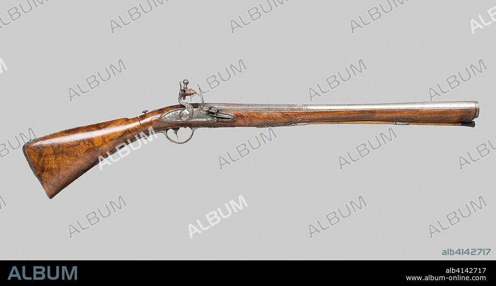 Flintlock Blunderbuss with a Folding Butt. Nicola Duna, Locksmith; Italian, Brescia(?). Date: 1775. Dimensions: L. 87.7 cm (34 1/2 in.)
Barrel L. 54 cm (21 1/4 in.)
Wt. 5 lb. 6 oz. Walnut, ash, horn, iron, and steel. Origin: Brescia.