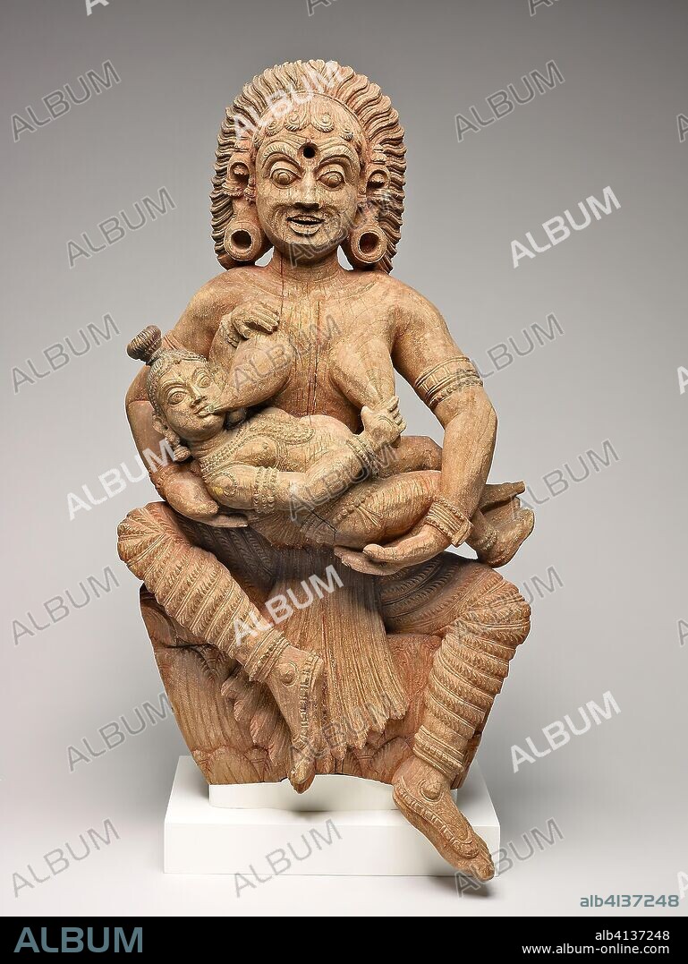The Infant Krishna Killing the Ogress Putana. India; Kerala. Date: 1601-1700. Dimensions: 73.2 x 35.4 x 24.1 cm (28 7/8 x 14 x 9 1/2 in.) (with base). Wood with traces of red and blue pigments. Origin: Kerala.