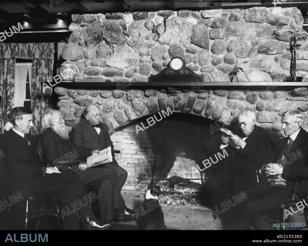 Napanoch, New York:  c. 1920 The Famous Four visiting the Yama Farms Inn in the Catskills. From left to right, Harvey Firestone, John Burroughs, owner Frank Seaman, Thomas Edison, and Henry Ford. The clock on the mantle has no hands or hours.