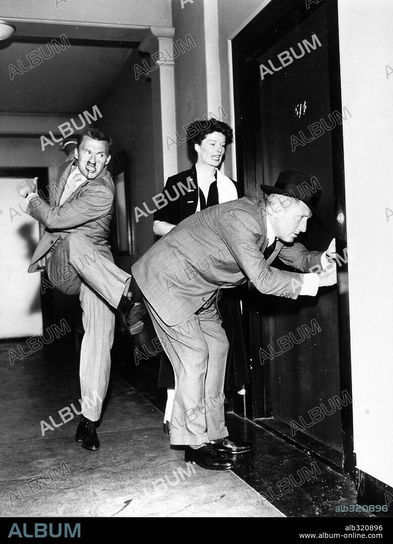 DAVID WAYNE, KATHARINE HEPBURN and SPENCER TRACY in ADAM'S RIB, 1949, directed by GEORGE CUKOR. Copyright M.G.M.