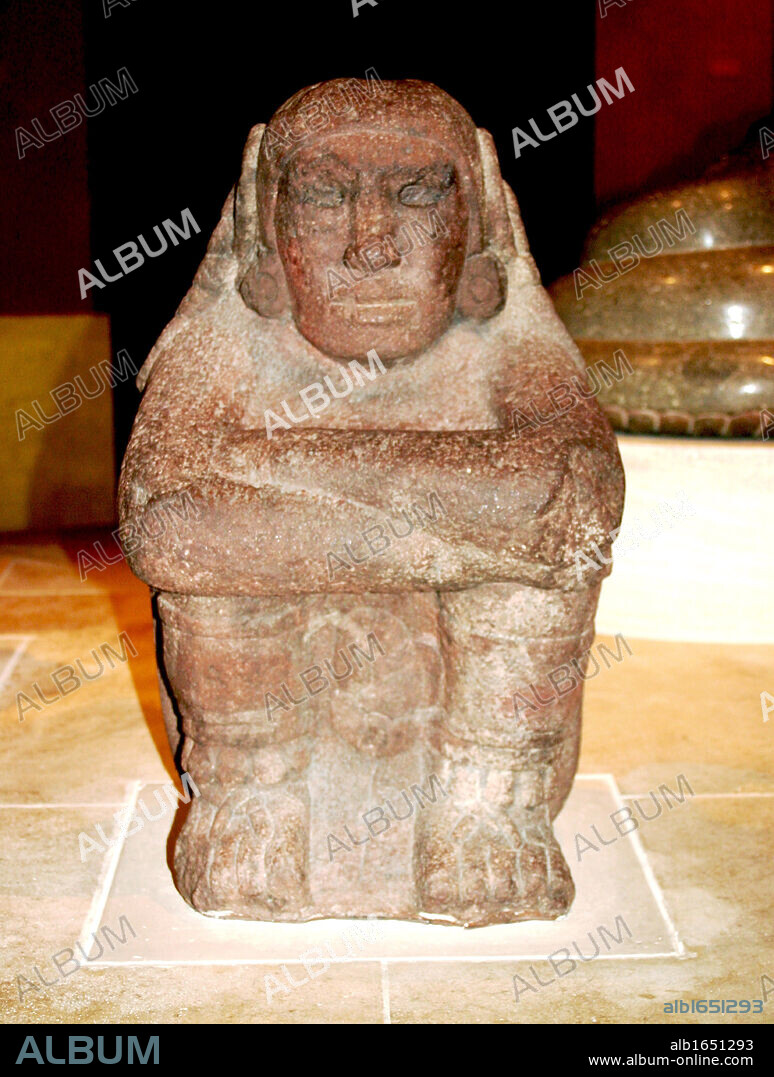 Stone seated figure of Xochipilli, Aztec, AD 1325-1521 From Mexico. Xochipilli was the Aztec god of music and dance. He was also named Macuilxochitl. Pre-Columbian Mesoamerican Religion Mythology Sculpture.
