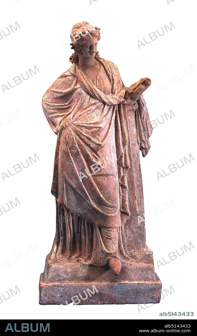 Girl, leaning against a pillar, clay, pressed into the form, painted (ceramic), clay, modelled and painted, Total: Height: 35.50 cm; Width: 17.00 cm; Depth: 9.80 cm, ceramic, standing figure, young woman, girl, early hellenistic, On a two-level base stands a slender girl in chiton and coat, leaning against a high pillar. She has her right hand supported in the side, in the left she was still wearing a bacchanalian mask when she entered the collection. Today the hand with the mask is broken off and no longer exists. The luxuriant, wavy hair is decorated with a wreath. On the white painting ground traces of color: robes pink, hair, shoes and pillars reddish brown, wreath blue.