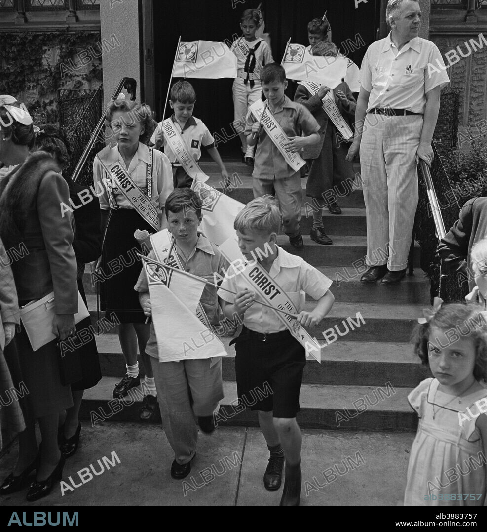 June 1944 - Brooklyn, New York. Children leaving the Sunday school of the Church of the Good Shepherd.