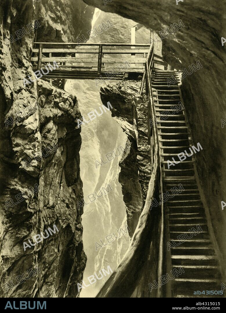 The Liechtenstein Gorge, Austria, c1935. The Liechtensteinklamm is a narrow gorge with walls up to 300 metres high, in the Austrian Alps near Salzburg. Prince Johann II of Liechtenstein had the wooden walkways installed in 1875. From "Österreich - Land Und Volk", (Austria, Land and People). [R. Lechner (Wilhelm Müller), Vienna, c1935].