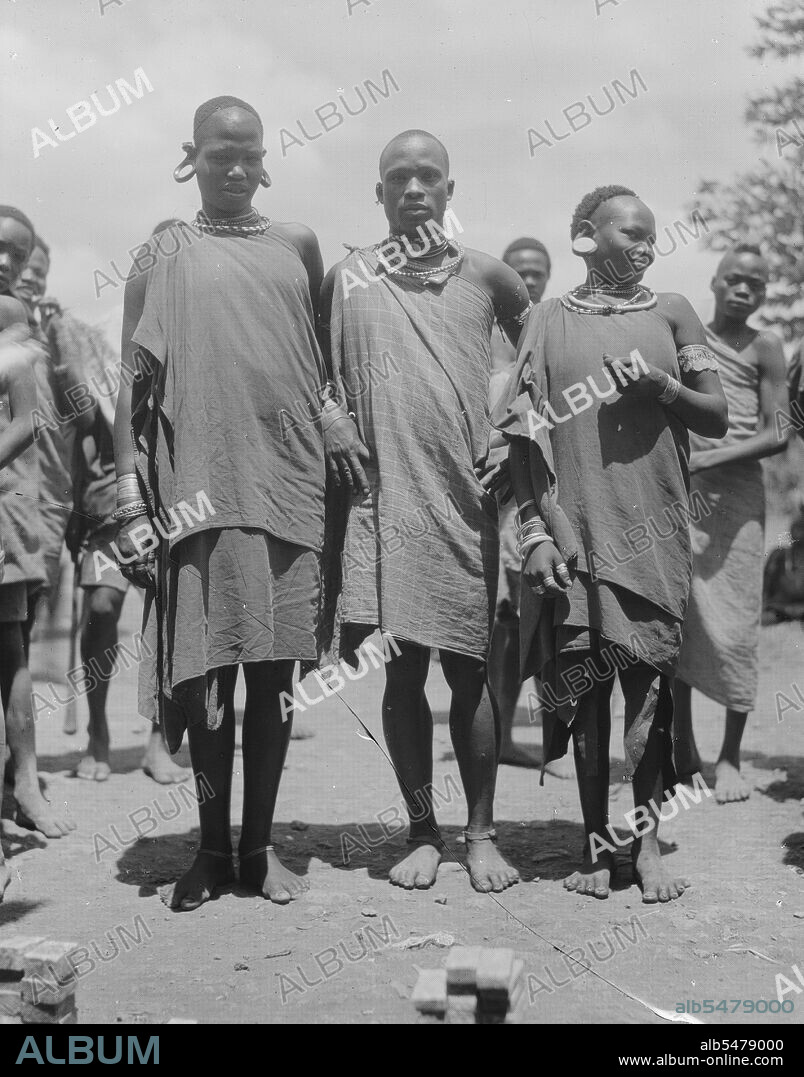 Wakikuyu types of men and women in Kenya, a Bantu ethnic group ca. 1936.