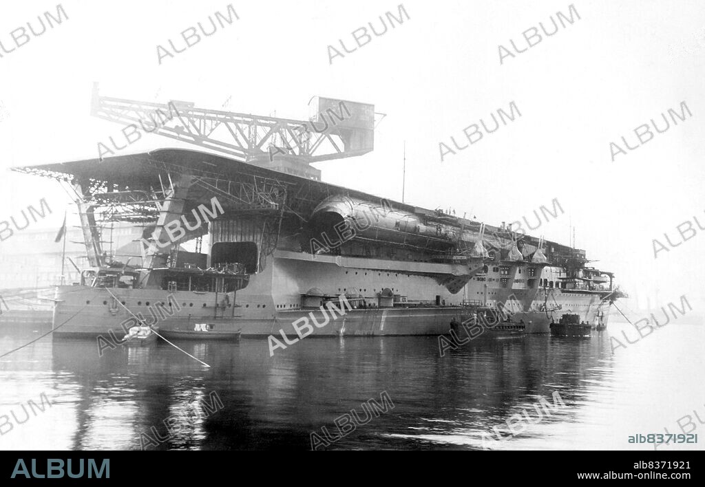 Kaga was an aircraft carrier built for the Imperial Japanese Navy (IJN) and was named after the former Kaga Province in present-day Ishikawa Prefecture. Originally intended to be one of two Tosa-class battleships, Kaga was converted under the terms of the Washington Naval Treaty to an aircraft carrier as the replacement for the battlecruiser Amagi, which had been damaged during the 1923 Great Kanto earthquake. Kaga was rebuilt in 193335, increasing her top speed, improving her exhaust systems, and adapting her flight decks to more modern, heavier aircraft.<br/><br/>. Kaga's aircraft first supported Japanese troops in China during the Shanghai Incident of 1932 and participated in the Second Sino-Japanese War in the late 1930s. With other carriers, she took part in the Pearl Harbor raid in December 1941 and the invasion of Rabaul in the Southwest Pacific in January 1942. The following month her aircraft participated in a combined carrier airstrike on Darwin, Australia, helping secure the conquest of the Dutch East Indies by Japanese forces.<br/><br/>. Following repairs, Kaga rejoined the 1st Air Fleet for the Battle of Midway in June 1942. After bombarding American forces on Midway Atoll, Kaga and three other IJN carriers were attacked by American aircraft from Midway and the carriers Enterprise, Hornet, and Yorktown. Dive bombers from Enterprise severely damaged Kaga; when it became obvious she could not be saved, she was scuttled by Japanese destroyers to prevent her from falling into enemy hands.<br/><br/>. The loss of four large attack carriers, including Kaga at Midway, was a crucial setback for Japan, and contributed significantly to Japan's ultimate defeat. In 1999, debris from Kaga including a large section of the hull was located on the ocean floor at a depth in excess of 5,000 meters (16,404 ft); 350 miles (560 km) northwest of Midway Island. The main part of the carrier's wreck has not been found.