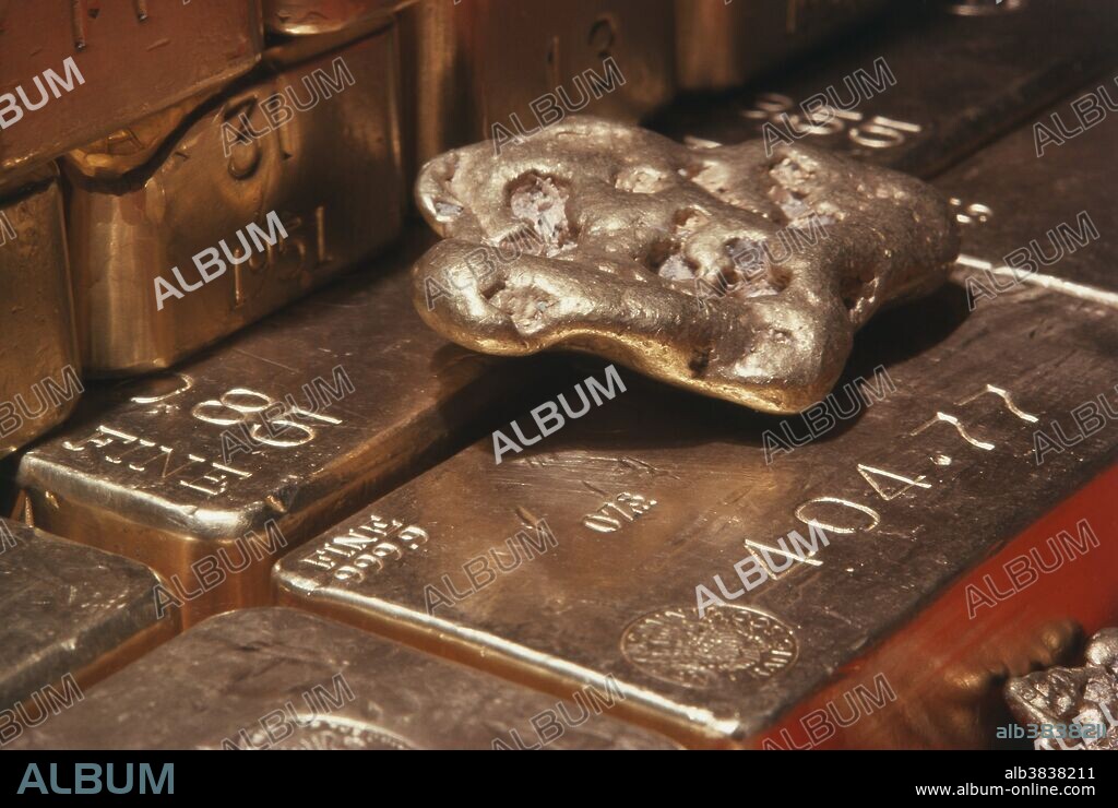 A gold nugget and 400-troy-ounce bars of .999 fine gold at the Old Mint in San Francisco.