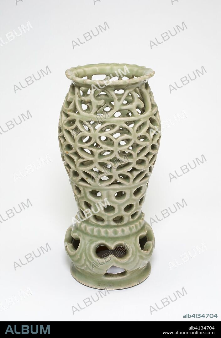 Openwork Braizer or Incense Stick Holder. China. Date: 1365-1499. Dimensions: H. 22.7 cm (8 15/16 in.); diam. 10.9 cm (4 5/16 in.). Longquan ware; celadon-glazed stoneware with carved decoration. Origin: China.