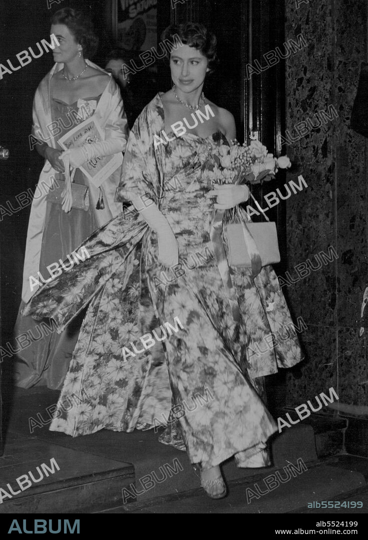 Wearing a floral evening gown, with matching stole, Princess Margaret leaves after the London premiere last night of the film "Daddy Long Legs" at the Carlton, Haymarket. The performance was to help the Invalid Children's Aid Association.The film, a musical, stars Fred Astaire and Leslie Caron. Leslie, who flew from home in Paris for the premiere, was presented to the Princess. June 07, 1955. (Photo by Daily Mirror).
