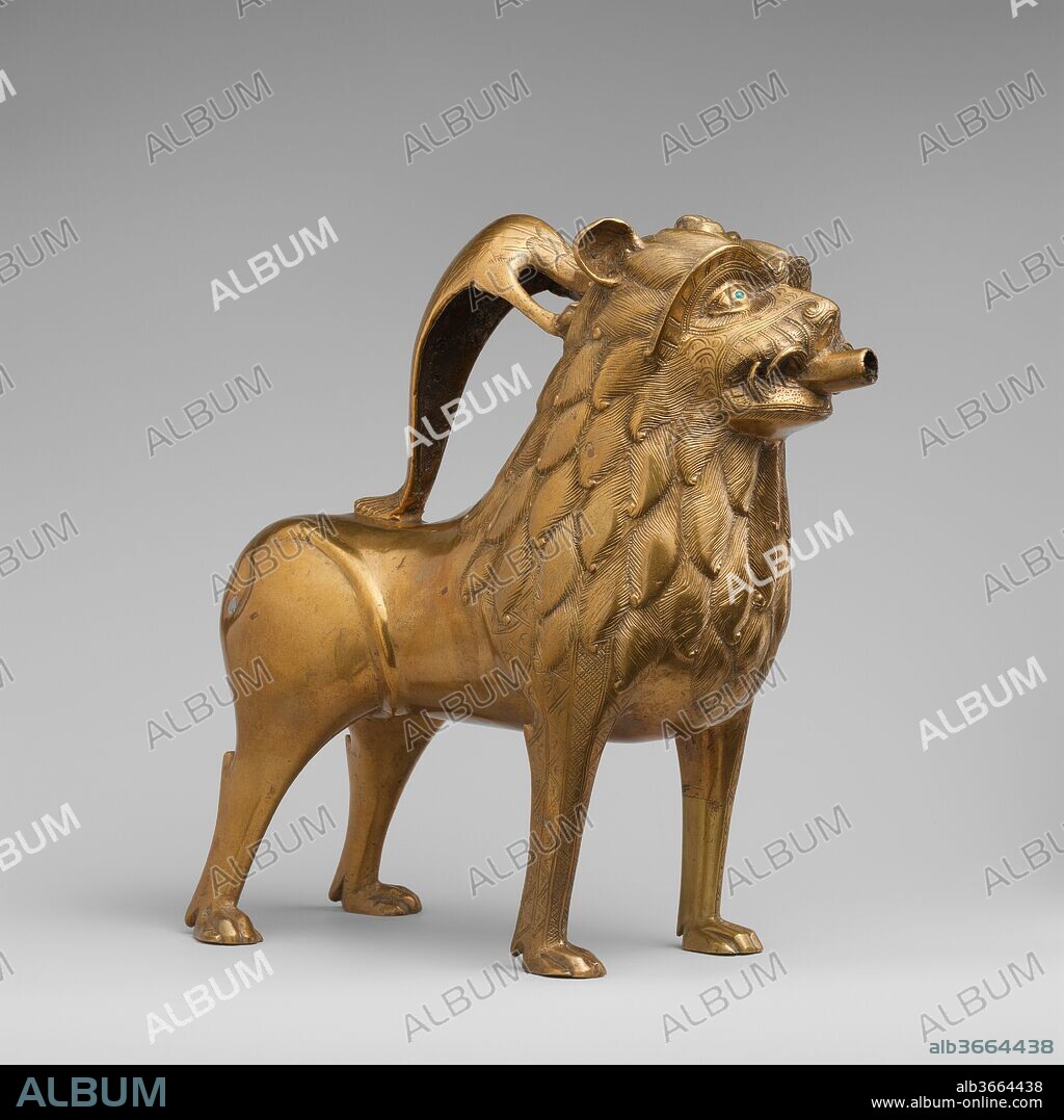 Aquamanile in the Form of a Lion. Culture: North German. Dimensions: Overall: 8 3/8 x 7 3/16 x 4 3/8 in. (21.2 x 18.2 x 11.1 cm), 6.091lb. (2763g)
Overall PD: 10 1/2 x 4 9/16 x 10 13/16 in. (26.7 x 11.6 x 27.4 cm)
Thickness PD: 2/25-3/25 in. (0.20-0.30 cm). Date: ca. 1200.
Derived from the Latin words for water (aqua) and hand (manus), an aquamanile (plural: aquamanilia) is an animal- or human-shaped water vessel used in hand washing, an essential component of religious and secular rituals in the Middle Ages. Aquamanilia were the first cast vessels of medieval Europe. Usually cast in copper alloy through the lostwax process (cire perdue), the hundreds of surviving examples date from the twelfth through fifteenth century. The Metropolitan Museum of Art has one of the most important collections of aquamanilia in the world, with examples at The Cloisters and in the main building on Fifth Avenue, in both the medieval galleries and the Lehman Collection.