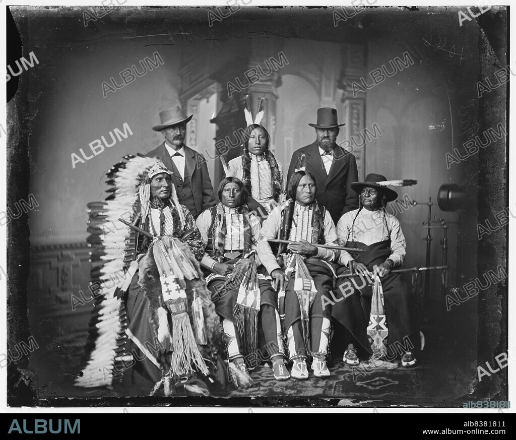 Group of Sioux Indians "Spotted Tail" (photo c. 1875). Standing: Joe Merrivale; Young Spotted Tail; Antoine Janis; Seated: Touch-the-Clouds; Little Big Man; Black Coal; last two are rapoves? indentified by George E. Hyde, 4229 Dangler? St., Omaha, Nebraska. [Antoine Janis was a French-American fur trader].