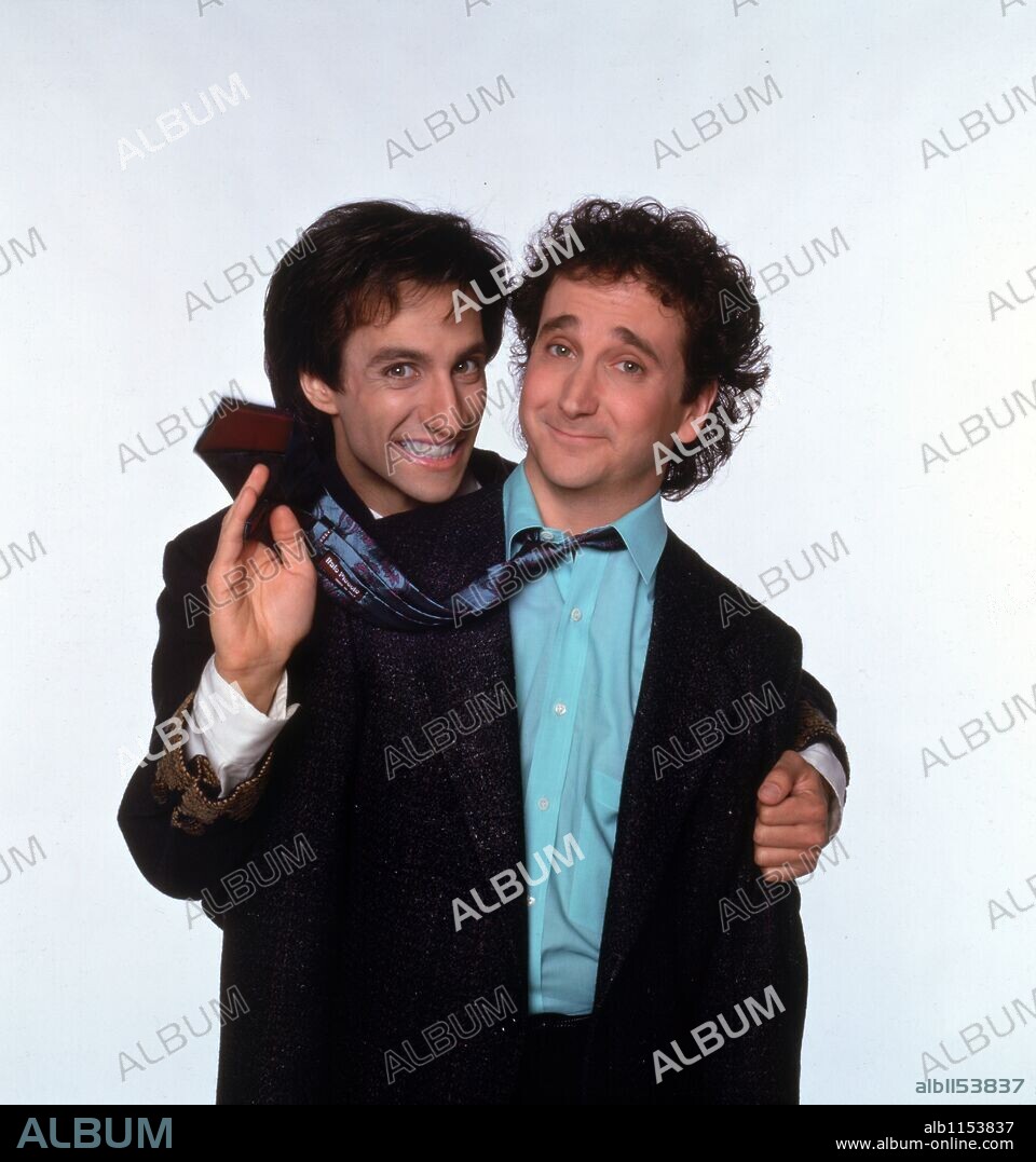 BRONSON PINCHOT and MARK LINN-BAKER in PERFECT STRANGERS, 1986, directed by DALE MC RAVEN. Copyright Lorimar Television/Miller-Boyett productions.