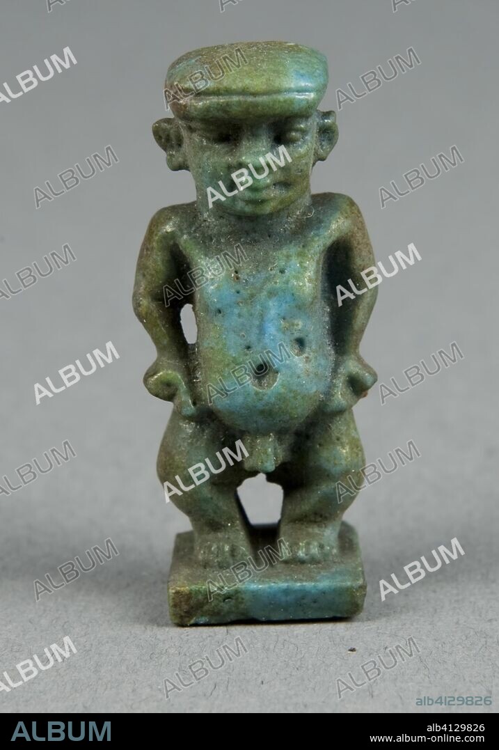 ANCIENT EGYPTIAN. Amulet of the God Pataikos. Egyptian. Date: 664 BC-332 BC. Dimensions: 3.5 × 1.6 × 1.3 cm (1 3/8 × 5/8 × 1/2 in.). Faience. Origin: Egypt.