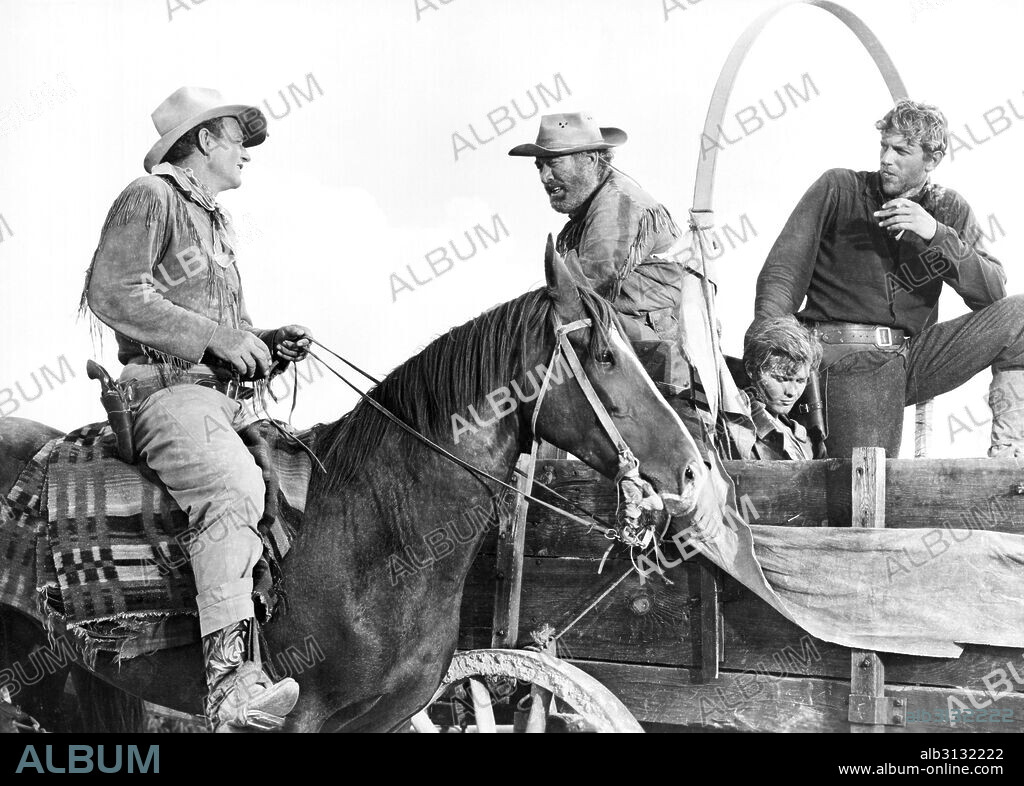 Hollywood, California:  1953 John Wayne stars in the Warner 3D western film, 'Hondo', basedon a short story by Louis L'Amour.  Left to right: Wayne, Ward Bond, James Arness.