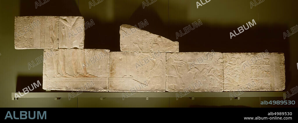 Horemheb, Tutankhamun, Anchesenamon, Audience, Block with lower legs of Tutankhamun and Anchesenam, relief, limestone, 56 × 86 × 12 cm, New Kingdom, 18th Dynasty, Tutankhamen, Egypt.