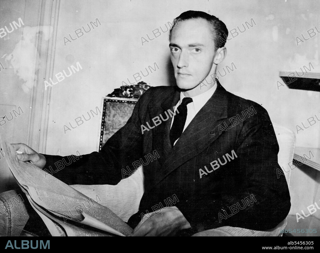 Austrian Archduke, Brother of Pretender, In Two-Roomed London flat was centre of "Incident" --  Archduke Robert of Austria at his flat in Kensington, London.Occupying a two-roomed flat in Kensington, London, is Archduke Robert of Austria, 31-year-old brother of Archduke Otto, Pretender to the Austrian throne.Archduke Robert lives in Belgium and is in England temporarily to put his affairs in order.Last December, he was the centre of an "incident" about which a question was asked in the House of Commons. July 16, 1946.